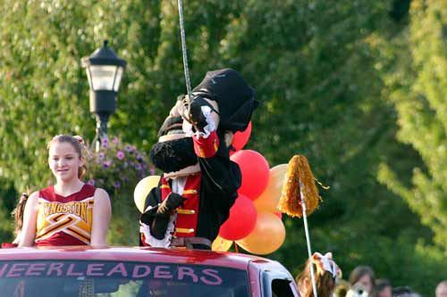 The Kingston High School Buccaneer mascot and Kingston cheerleaders led the way during the 2011-12 KHS Homecoming Parade Thursday evening.