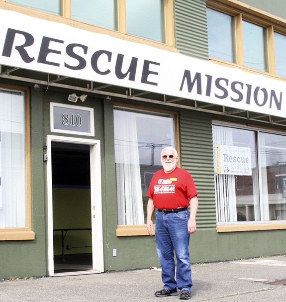 Kitsap Rescue Mission Executive Director Walt Le Couteur stands in front of the organization’s newly purchased building at 810 Sixth Street in downtown Bremerton.