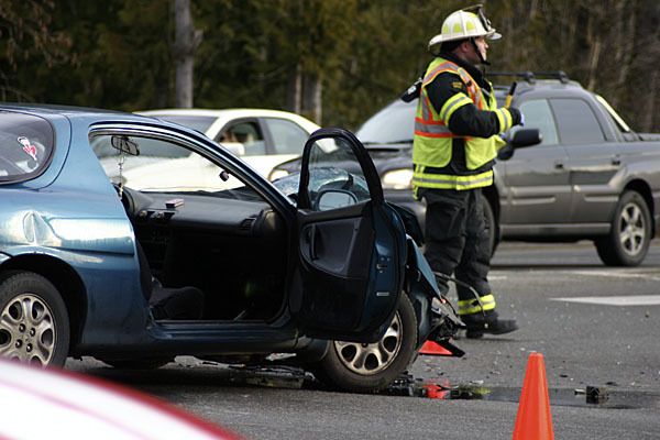 At least one person was reported injured in a collision at Highway 305 and Bond Road Thursday morning.