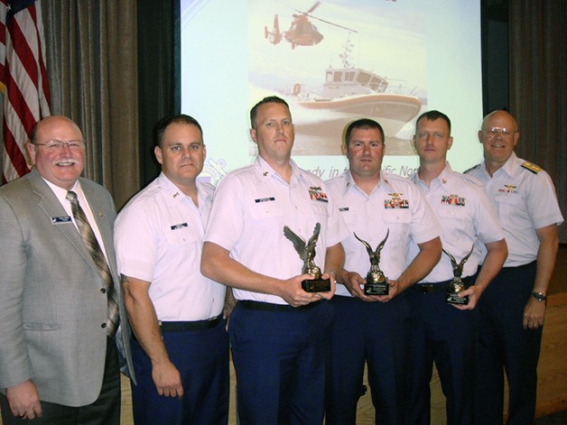 Three  U.S.  Coast  Guard  Enlisted  Persons  of  the  Quarter  (EPOQs)  were recognized by the Navy League of the United States Bremerton/Olympic Peninsula Council during an August 12th luncheon. Assembled left to right: Council President
