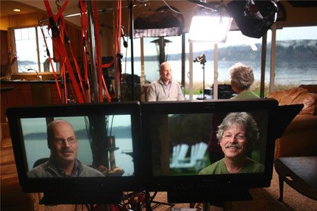 Olalla author Gregg Olsen (left) prepares with a sound engineer before a national television interview regarding his new true-crime book 'A Twisted Faith.'