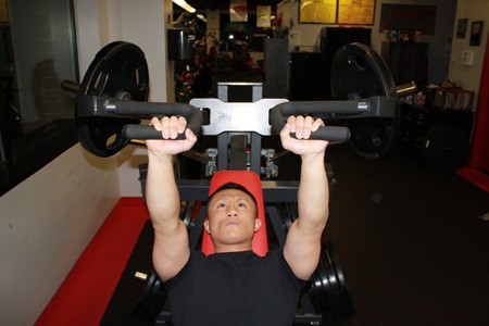 John Aguihon works out Tuesday morning at Snap Fitness.