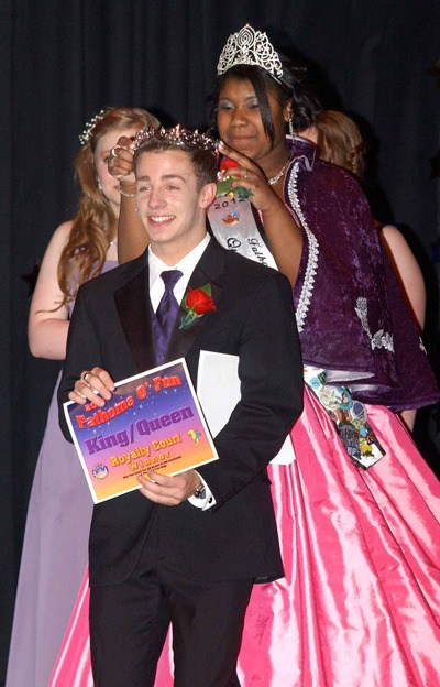 Aaron Thomas as crowned 2013 Fathoms O'Fun King by outgoing 2012 Queen Tamika Miller during the March 2 pageant at Christian Life Center.
