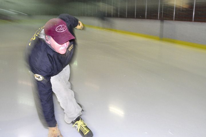 Bill Paulsen streaks across the ice on his way to covering 14 miles worth of laps around the Bremerton Ice Center’s rink Wednesday morning. Part of a senior skate that does a low-impact workout two days a week. “Unless you fall
