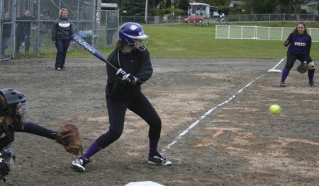 North Kitsap High’s Jacquelyn Stenman prepares to swing at a fastball Tuesday in Poulsbo.