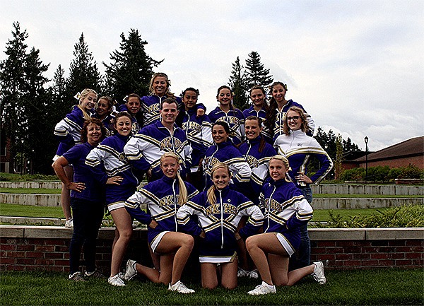 The North Kitsap cheer team with its coaches at stunting camp