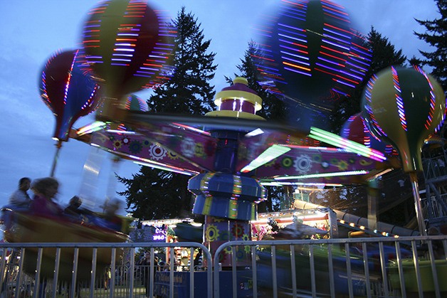 The lights of carnival rides at night make for a spectacular view at the Kitsap County Fair