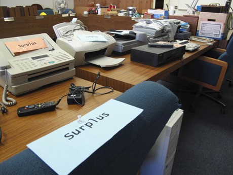 Office supplies of all type and size are stacked throughout Poulsbo’s old city hall at 19050 Jensen Way. More than 250 items