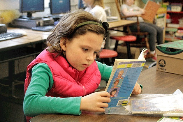 Jane Ritchie Reinhardt reads during her second-grade class at Pearson Elementary School.