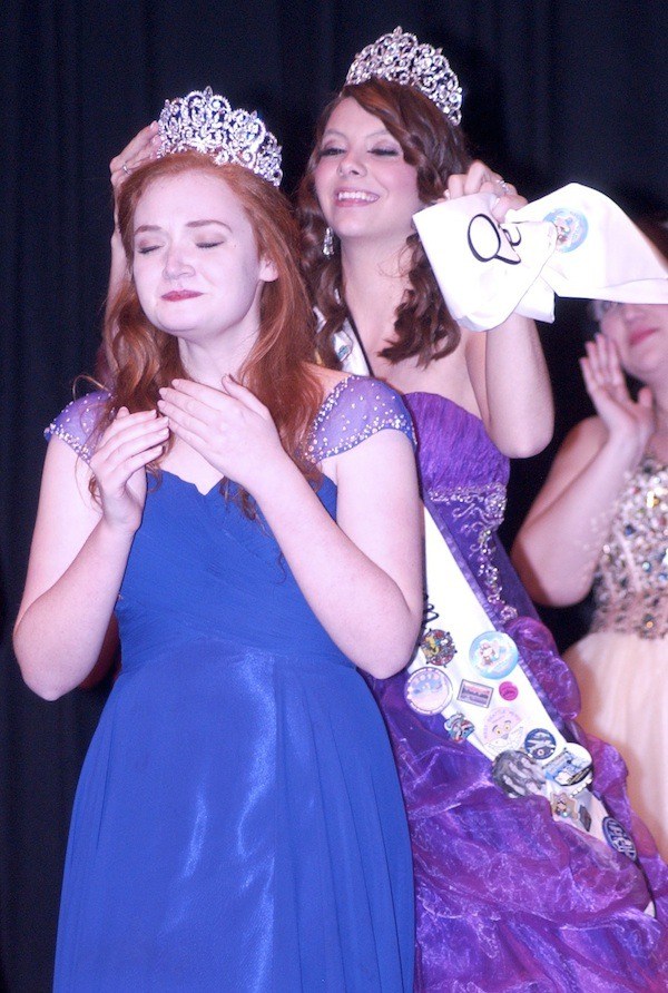 Charlotte Whitten holds back tears as she is crowned queen by Devenn Miller