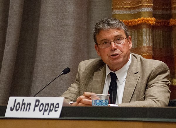 Port of Bremerton commissioner candidate John Poppe speaks at the Norm Dicks Government building during a debate Oct. 13.