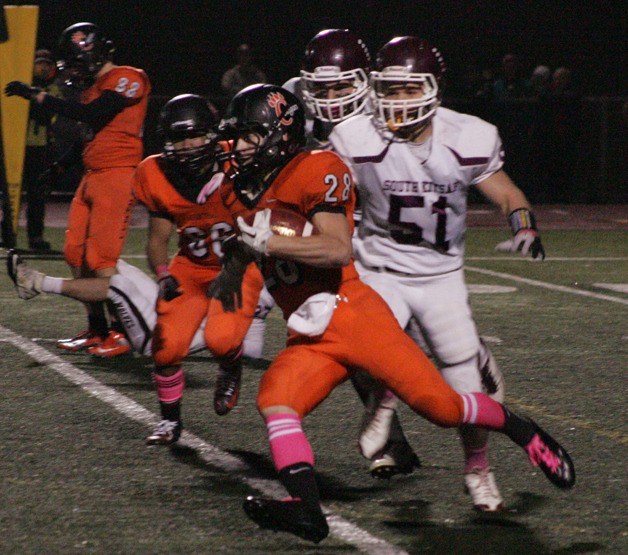 Senior Nicholas Zawadzki carries the ball for Central Kitsap Oct. 26 during the 21-14 victory over South Kitsap.