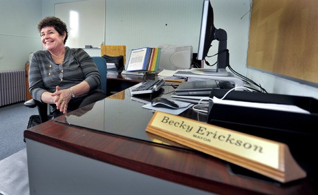 Becky Erickson settles into her new office Monday. She was legally sworn in as Poulsbo’s new mayor on Dec. 28.