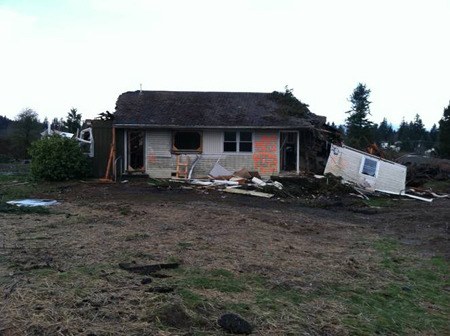The last housing unit at the old Westpark housing project was used by fire fighters and law enforcement for training prior to its demolition Tuesday.