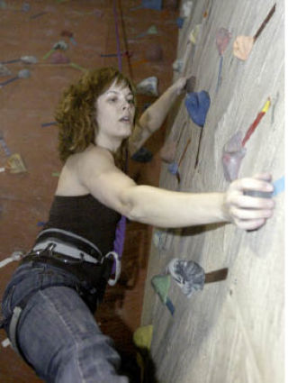 Vertical World member Sara Lingafelter climbs one of the walls at the Bremerton climbing gym.