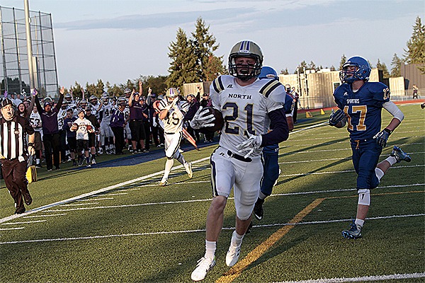 Senior Sean Crowell running in to the end zone to score the first touchdown of the game against Bainbridge.