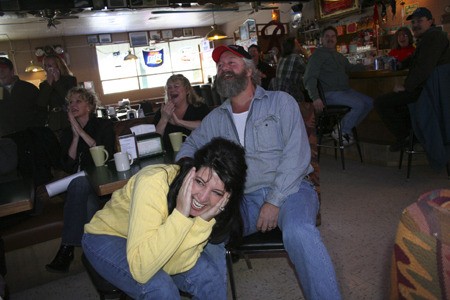 Millora Westerlund watches her “Price is Right” appearance on TV at the J-R Saloon with her husband
