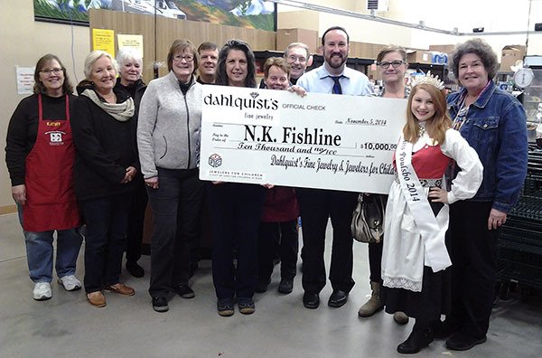 Holding the oversized check