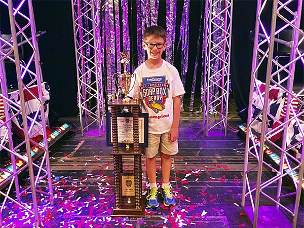 Quinny Stuart with his third-place trophy at the after party in Akron