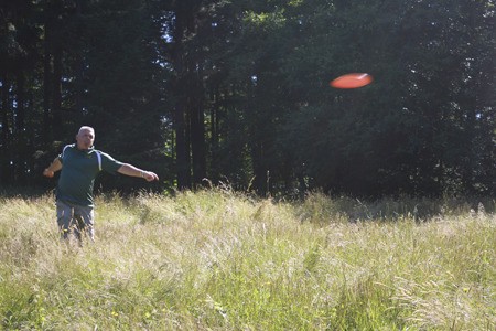 Paul Wright throws his disc with force Tuesday at the Bud Pell at Ross Farms course.