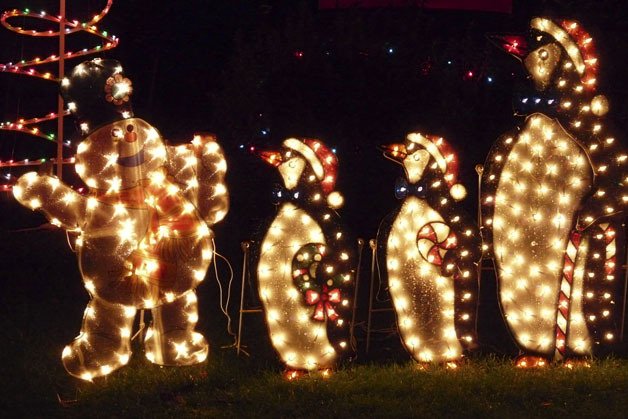 Frosty the Snowman and winter penguins greet visitors to the Hawkins home on Bainbridge Island.