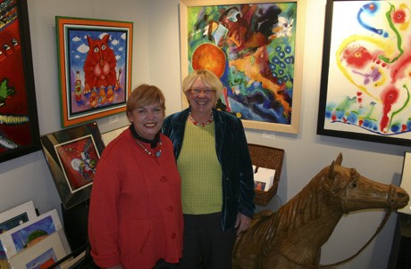 Founding member Susan VanderWey and owner Jessica Osborn in A is for Artists Gallery