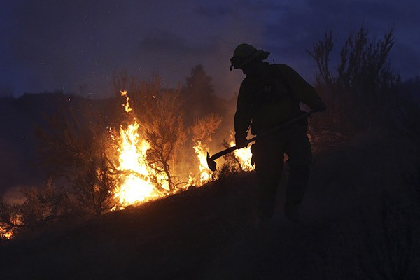 Gold Bar fire Lt. Scott Coulson investigates brush fires in the hills outside of Omak
