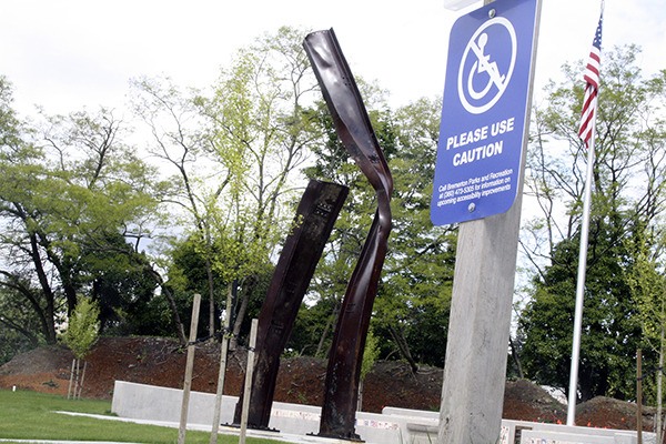 The City of Bremerton recently installed a sign at the Kitsap 9/11 Memorial urging visitors in wheelchairs to use caution on the non-ADA compliant path leading to the site.