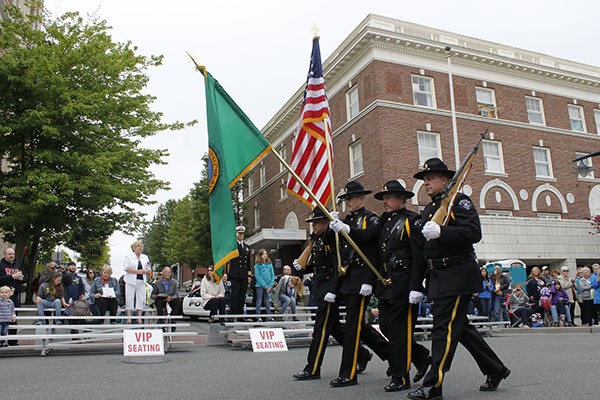 Bremerton Police color guard marches along Pacific Avenue at the Armed Forces Day Parade May 16.