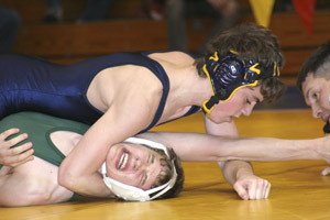 Bremerton 119-pounder Andrew Beliveau locks up Port Angeles Scott Belcher en route to a pin at last weekends 3A SubRegional.