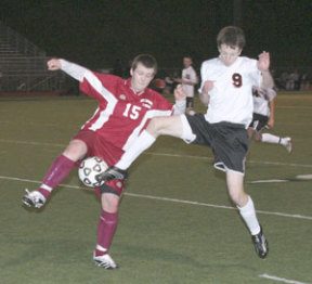 Central Kitsap junior Drew Blaisdell tries to win the ball in the air against Mount Tahoma’s Aaron Wilson in CK’s 6-1 win last week.