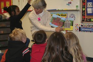 Bremerton Rotary Club member Shawna Bliss reads to Kitsap Lake Elementary students during Brr.