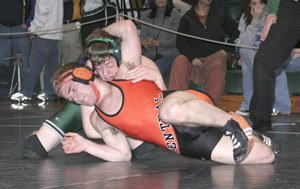 CKs Chad Massida tries to circle out of the grasp of Danny Zimny of Klahowya in the 152-pound final at the Klahowya Klassic Saturday