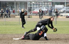 CK’s Brittany Woolford slides safely into second base as Klahowya’s Meika Bumbalough pulls her foot off the bag.