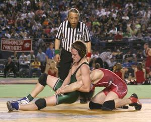 Klahowyas Neil Sell tries to get an advantage against Bellinghams Tyler Perry in the 2A 135-pound title match. Perry won 14-8