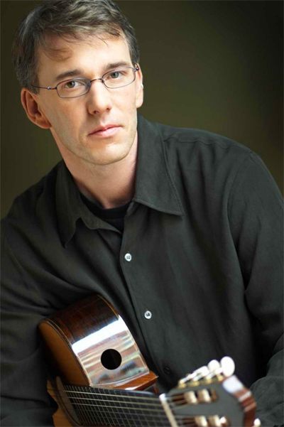 Classical six-stringer Michael Partington gives solo performance on the island this weekend.
