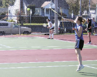 Bremerton’s Sandy Schmidt serves up the ball in last Friday’s 4-3 win against Klahowya.