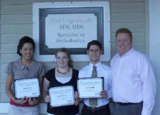 Local orthodontist Dr. Paul Lingenbrink awarded four $750 scholarships to (from left) Regina Ogazi