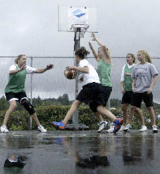 Two teams battle it out in the women’s division at last year’s 3-on-3 Silverdale Shoot-Out.