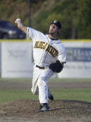 Kitsap starting pitcher Chad Wagner fires the ball to the plate against the Bend Elks Tuesday.
