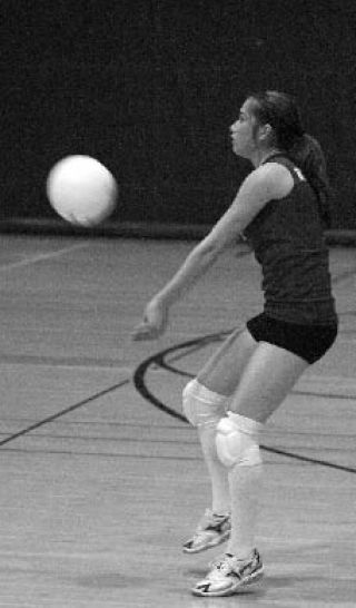 Bremerton’s Stephanie Himmelsbach sets up the ball against Sequim in a game last season.
