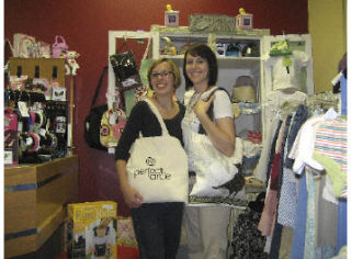 Laura Nesby (left) and Jenna Mathews opened Perfect Circle Consignment for Ladies & Children in May. The consignment shop is on Kitsap Way in Bremerton