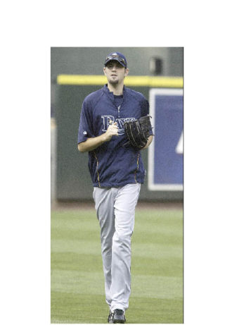 Jason Hammel loosens up in the outfield prior to last week’s visit to Safeco Field.