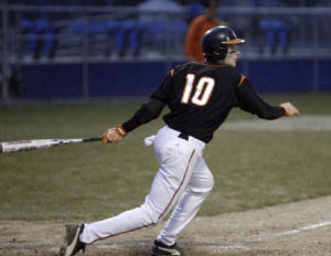 Central Kitsap’s Daniel Zylstra connects for a double against Olympic on Tuesday. CK won 17-2
