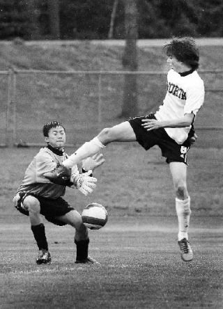 Sophomore junior varsity player Pete Pearson puts the pressure on Lincoln’s goalie during Monday’s JV matchup. The JV Vikes won 8-0.