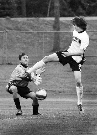 Sophomore junior varsity player Pete Pearson puts the pressure on Lincoln’s goalie during Monday’s JV matchup. The JV Vikes won 8-0.