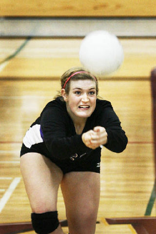 North Kitsap’s Claire Torstenbo dives for a dig during action against Kingston Tuesday.