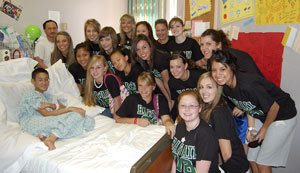 Central Kitsap Junior High School freshman Chip Fukukhara received a visit from the Klahowya Secondary School cheer squad during his stay at KapiOlani Medical Center for Women and Children in Honolulu.