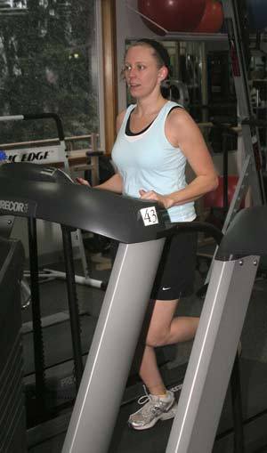 Silverdale Fitness intern Alexis Haws works out on a treadmill at Silverdale Fitness.