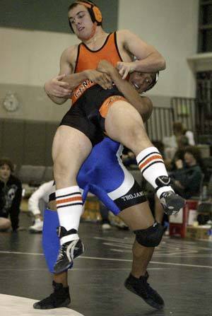 Olys Laurice Gerig lifts CKs Howie McDonald in Gerigs first match back at 189 pounds.